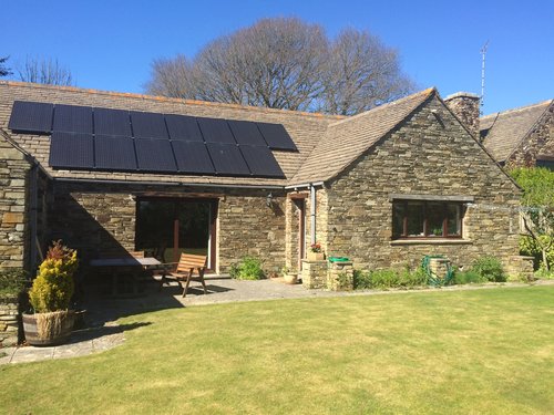 Image of a house with a solar panels install that we have done in the countryside